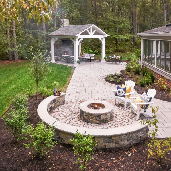 paver patio with fire pit, sitting wall, pavilion and outdoor fireplace