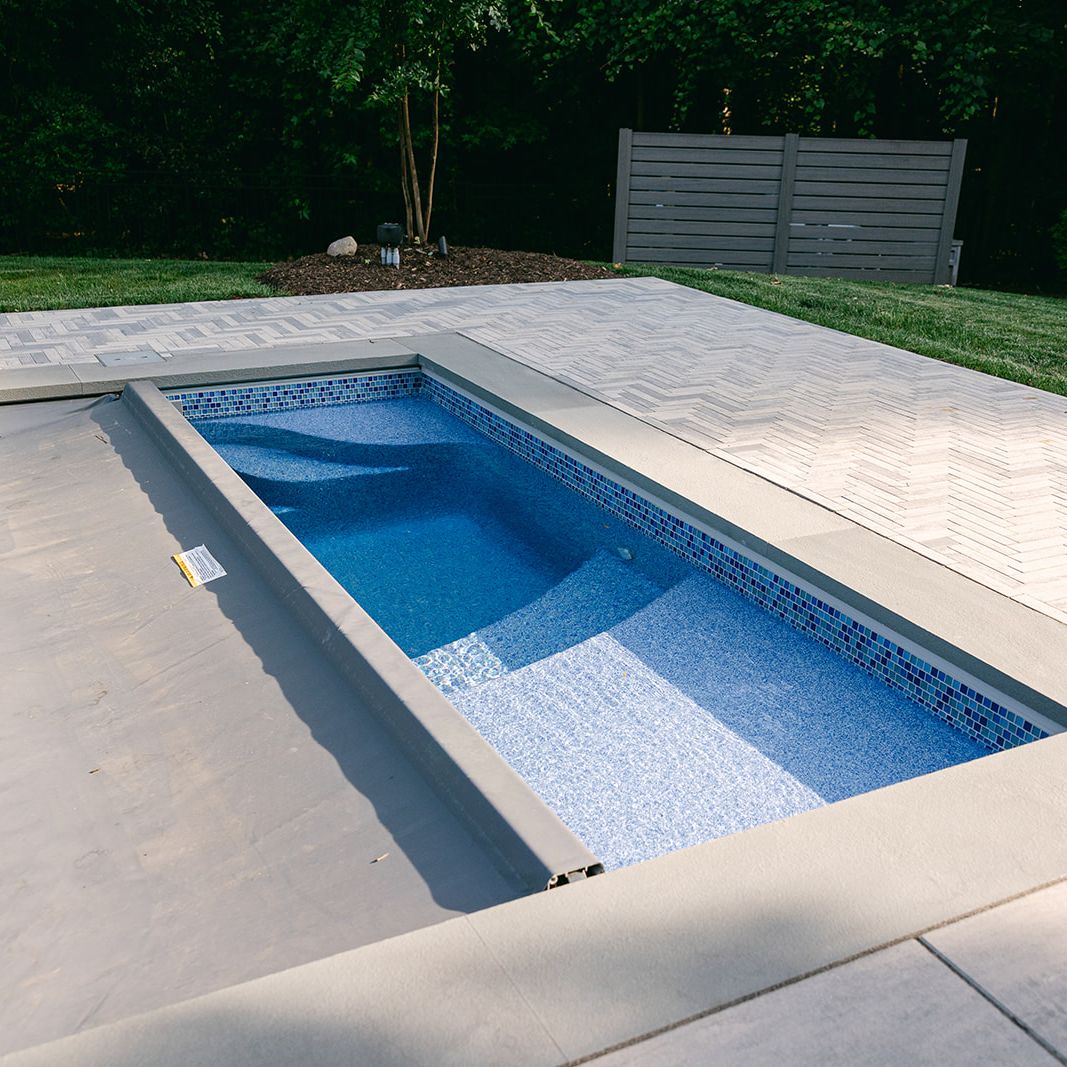 fiberglass swimming pool with automatic cover