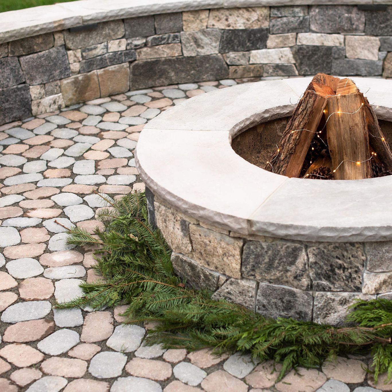 Around the base of a Fire Pit