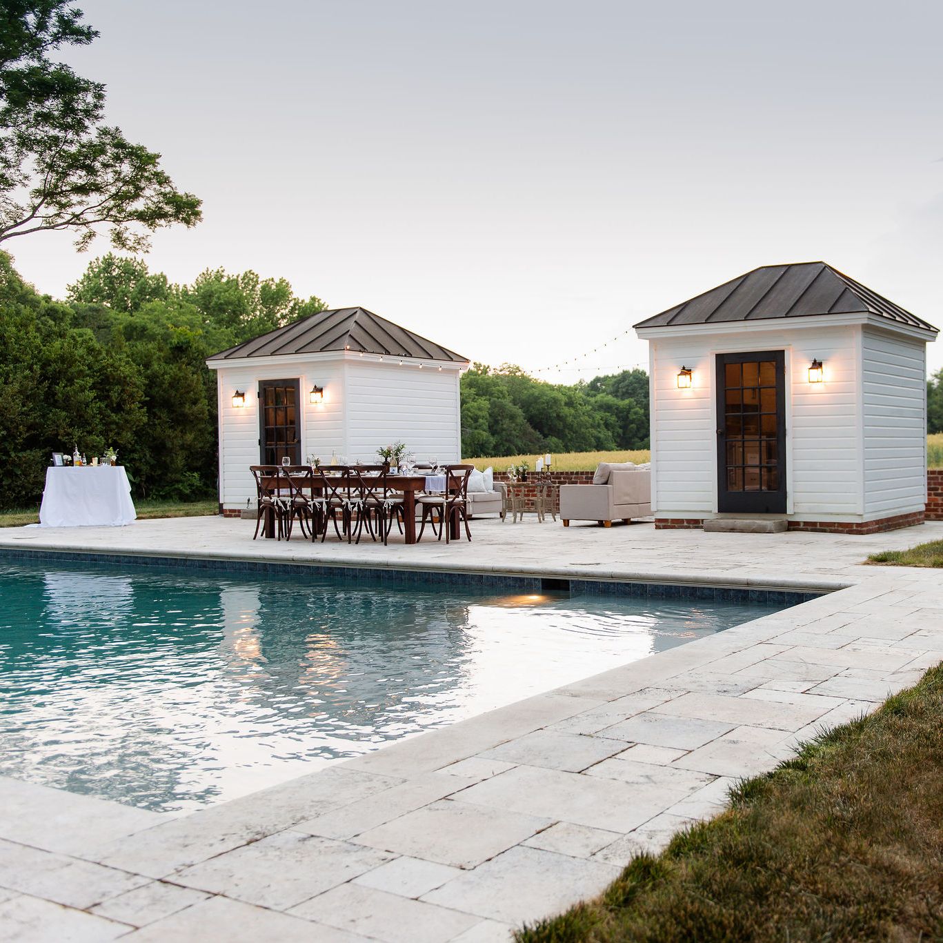 Rectangle pool with travertine pool decking