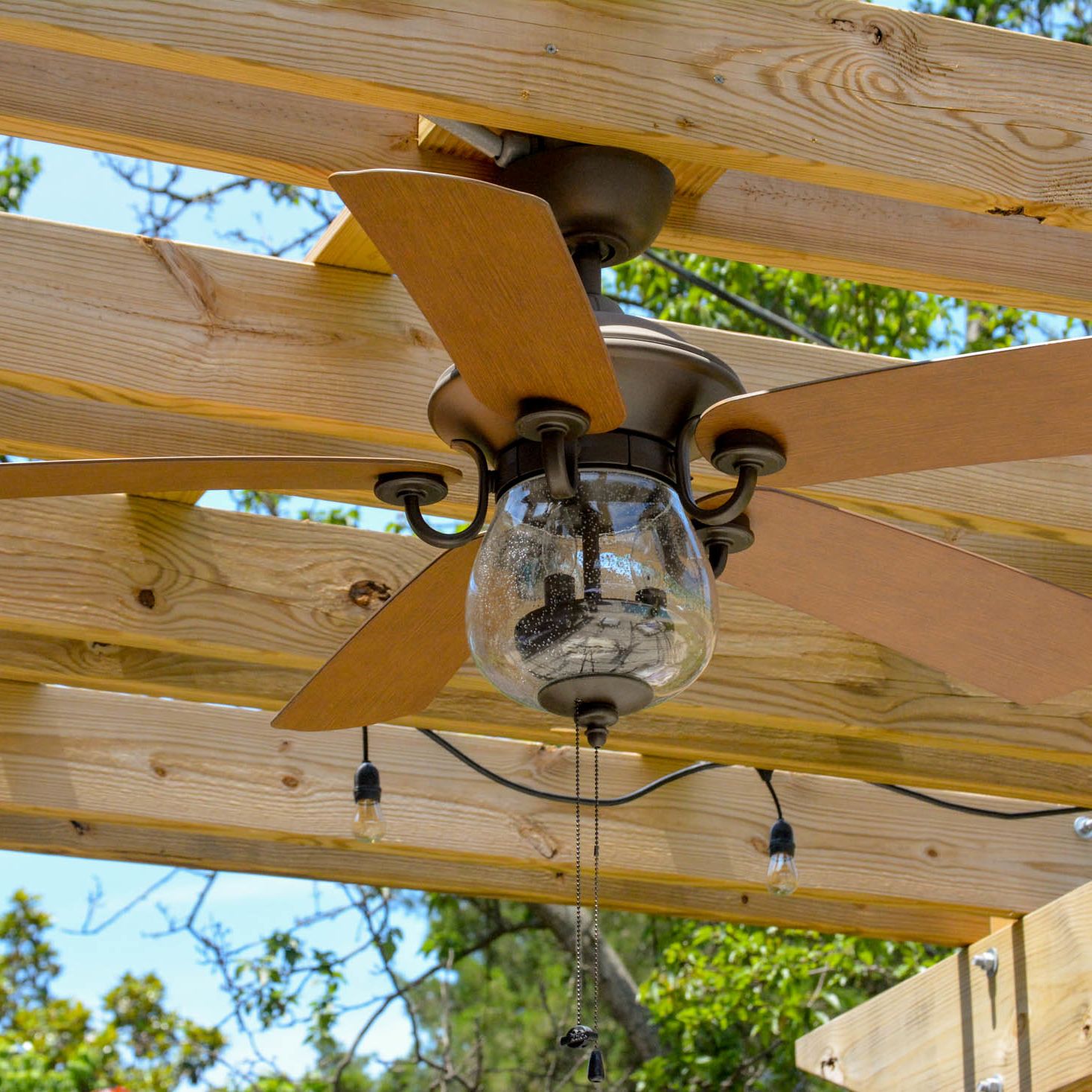 Outdoor pergola fan in backyard