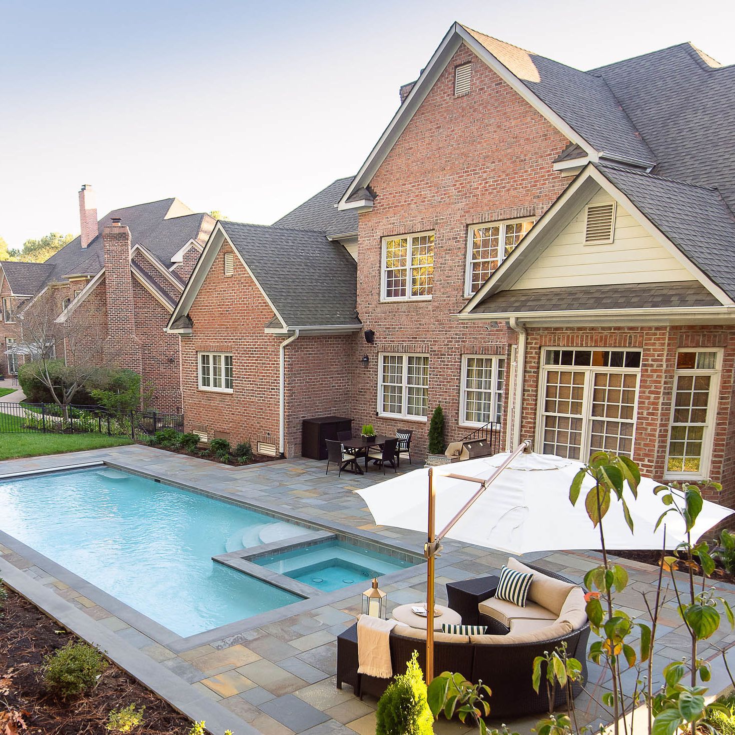 Beautiful, large brick home with backyard pool and sitting area