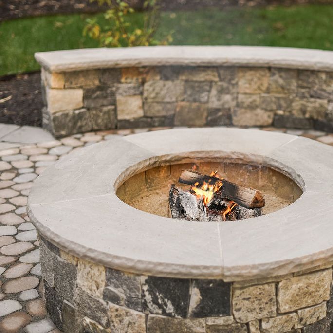 Paver patio with fire pit and sitting wall